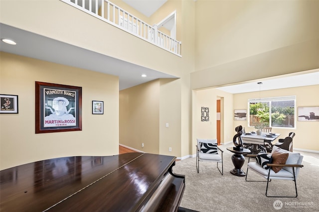 dining space with carpet flooring, recessed lighting, and baseboards