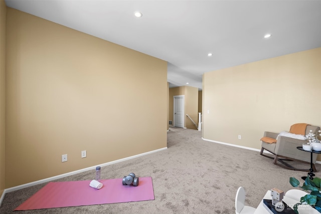 workout area featuring baseboards, carpet flooring, and recessed lighting
