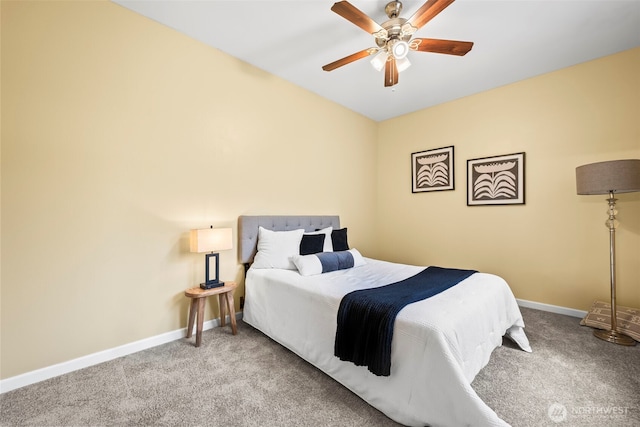 bedroom featuring carpet floors, a ceiling fan, and baseboards