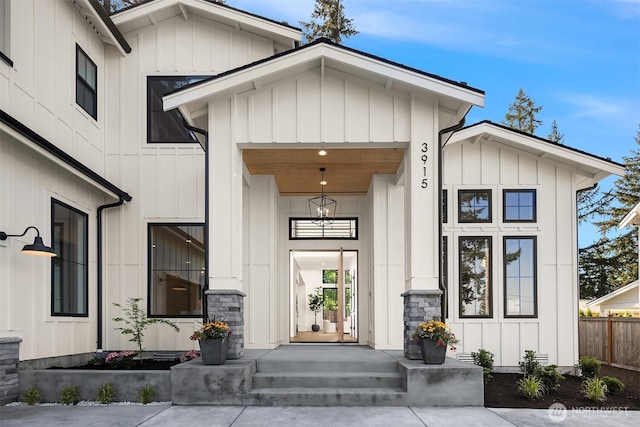 entrance to property featuring board and batten siding