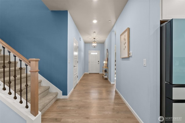12011 SE 299th Pl, Auburn, WA 98092 - corridor with light wood-type flooring, recessed lighting, baseboards, and stairway
