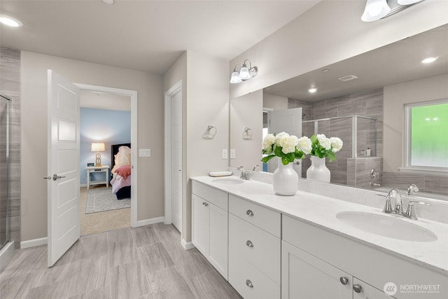 12011 SE 299th Pl, Auburn, WA 98092 - ensuite bathroom with double vanity, a sink, and a stall shower