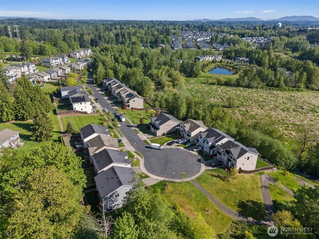 12011 SE 299th Pl, Auburn, WA 98092 - aerial view with a water view, a view of trees, and a residential view