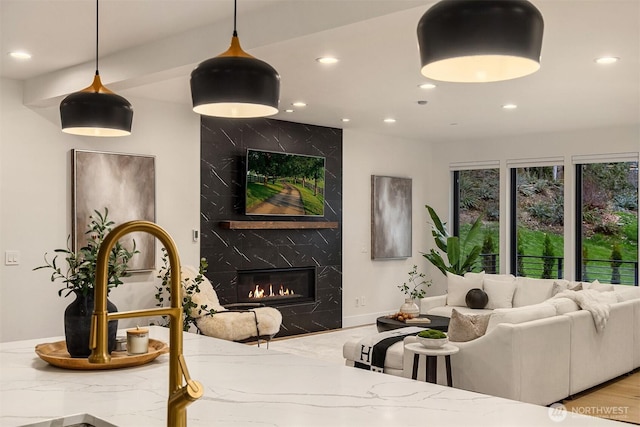 3230 290th Way NE, Redmond, WA 98053 - living room with recessed lighting and a high end fireplace