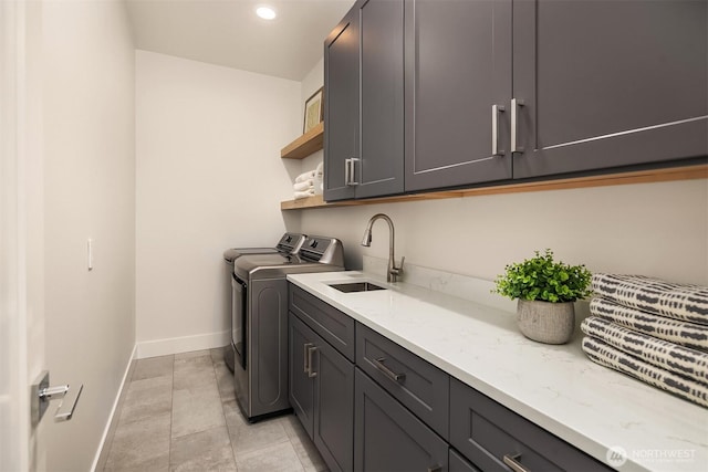 3230 290th Way NE, Redmond, WA 98053 - washroom featuring cabinet space, washer and clothes dryer, baseboards, and recessed lighting