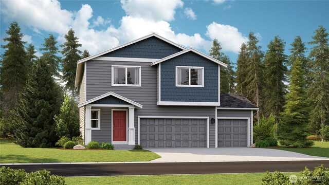 view of front of home with an attached garage, driveway, and a front lawn