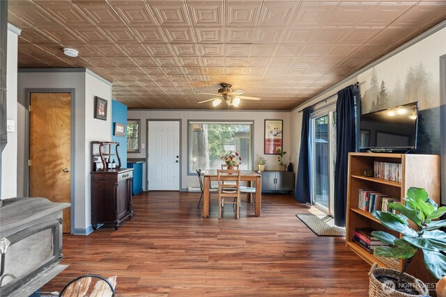 37 Butterfly Ln, Pacific Beach, WA 98571 - dining room with an ornate ceiling, baseboards, ceiling fan, and wood finished floors