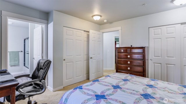 25025 SE Klahanie Blvd Unit L104, Sammamish, WA 98029 - bedroom featuring baseboards and light carpet