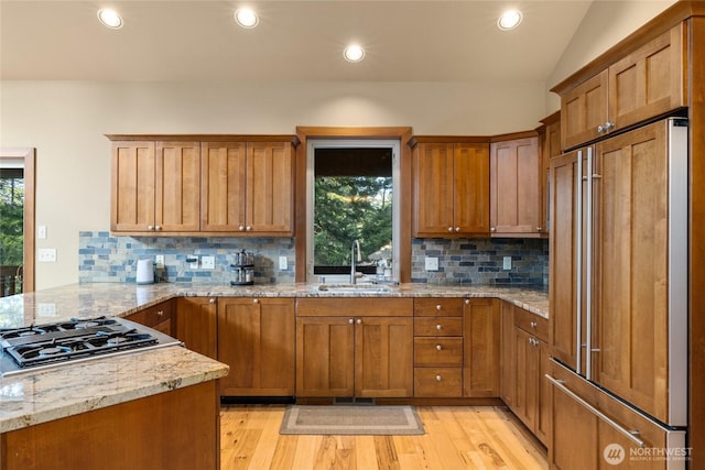 1570 Skull Springs Rd, Cle Elum, WA 98922 - kitchen featuring high end fridge, a sink, stainless steel gas stovetop, plenty of natural light, and recessed lighting