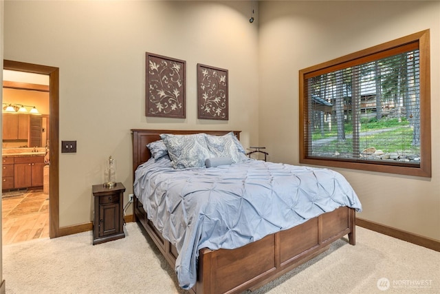 1570 Skull Springs Rd, Cle Elum, WA 98922 - bedroom featuring light carpet, baseboards, and a towering ceiling