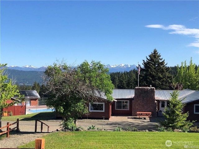 1570 Skull Springs Rd, Cle Elum, WA 98922 - view of front of property with metal roof and a mountain view