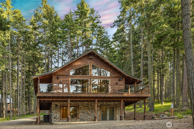 1570 Skull Springs Rd, Cle Elum, WA 98922 - view of front of home featuring a deck and stone siding