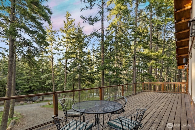 1570 Skull Springs Rd, Cle Elum, WA 98922 - deck at dusk featuring outdoor dining space