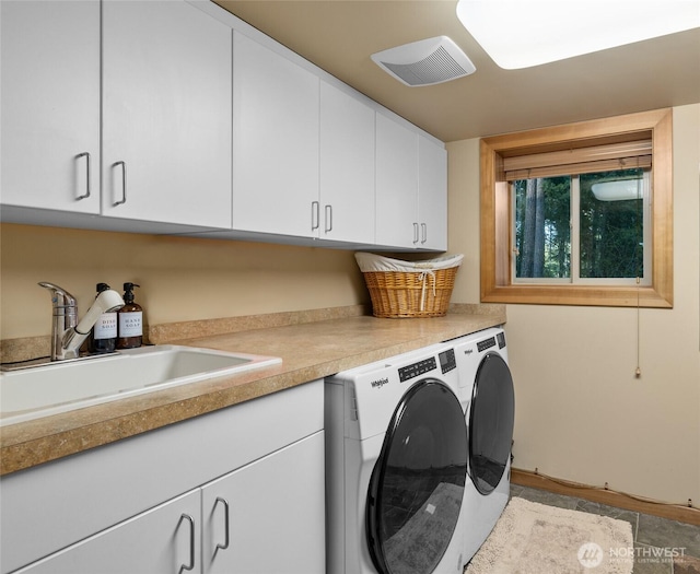 1570 Skull Springs Rd, Cle Elum, WA 98922 - laundry room featuring cabinet space and washing machine and dryer