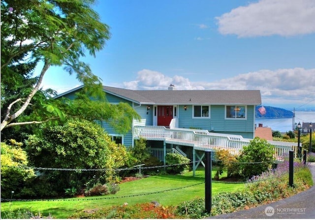 1319 Madrona Way NW, Gig Harbor, WA 98332 - raised beach house featuring a front lawn