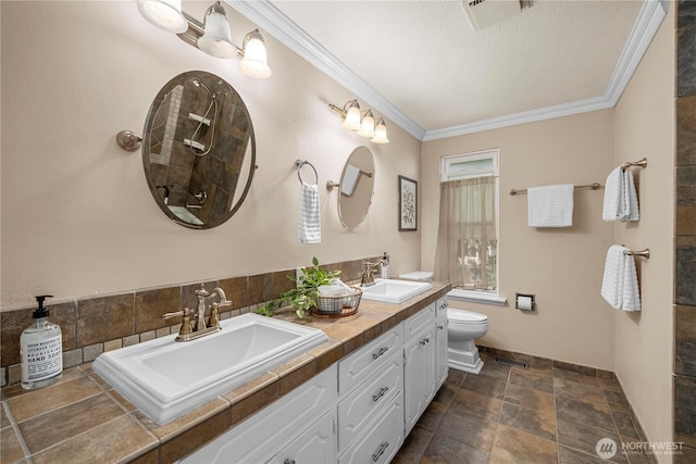 1319 Madrona Way NW, Gig Harbor, WA 98332 - bathroom with toilet, tiled shower, crown molding, and a sink