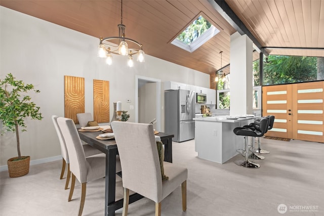 18265 47th Pl NE, Lake Forest Park, WA 98155 - dining space featuring a chandelier, a wooden ceiling with exposed beams, high vaulted ceiling, and a skylight