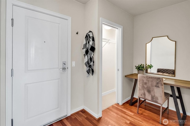 819 Virginia St Unit 3006, Seattle, WA 98101 - entrance foyer with baseboards and wood finished floors
