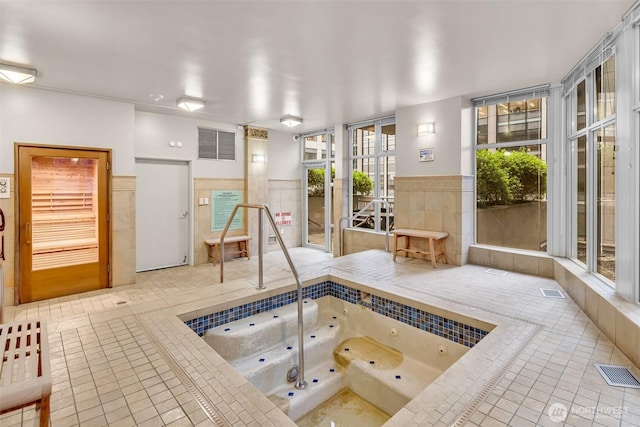 819 Virginia St Unit 3006, Seattle, WA 98101 - sunroom with a hot tub and visible vents