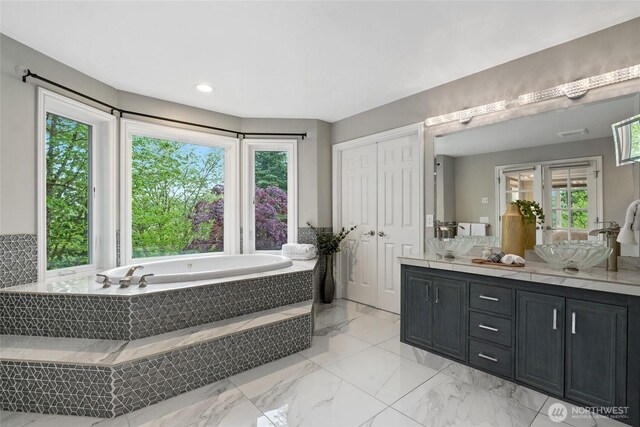 46707 SE 156th Pl, North Bend, WA 98045 - full bath featuring double vanity, a garden tub, marble finish floors, and recessed lighting