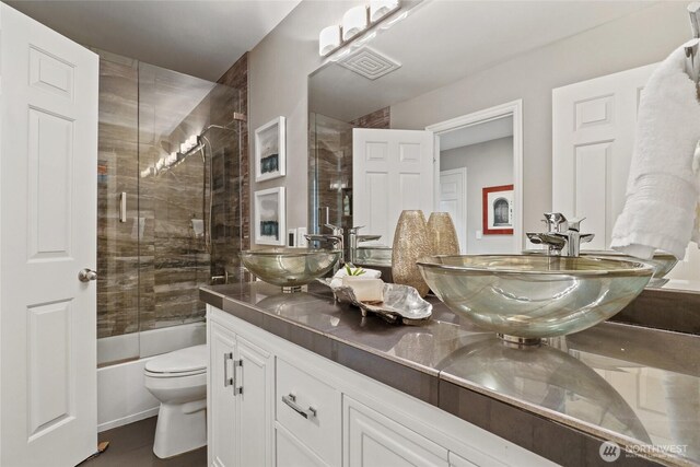 46707 SE 156th Pl, North Bend, WA 98045 - full bathroom with toilet, enclosed tub / shower combo, and double vanity