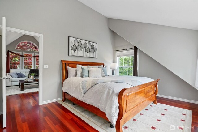 46707 SE 156th Pl, North Bend, WA 98045 - bedroom featuring lofted ceiling, wood finished floors, and baseboards