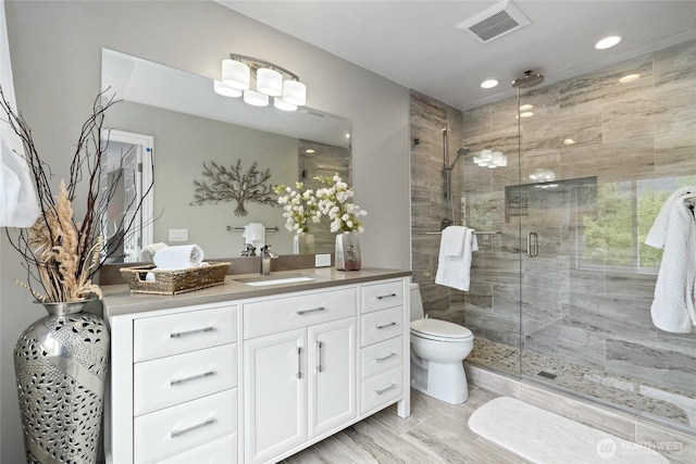 46707 SE 156th Pl, North Bend, WA 98045 - full bath with a stall shower, vanity, toilet, and recessed lighting