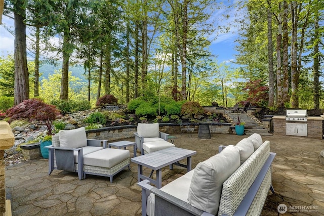46707 SE 156th Pl, North Bend, WA 98045 - view of patio featuring an outdoor hangout area, area for grilling, and an outdoor kitchen