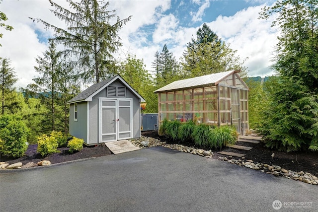 46707 SE 156th Pl, North Bend, WA 98045 - view of greenhouse featuring a storage shed