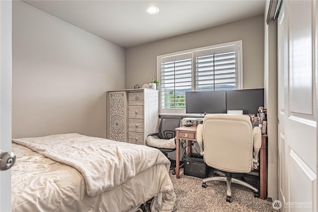 carpeted bedroom featuring recessed lighting