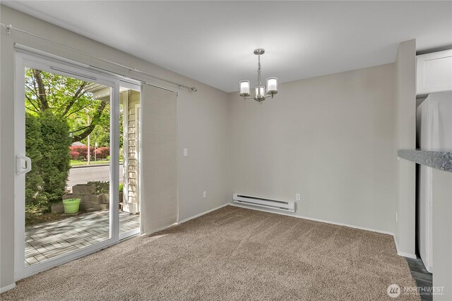 unfurnished room featuring carpet flooring, baseboards, a chandelier, and a baseboard radiator