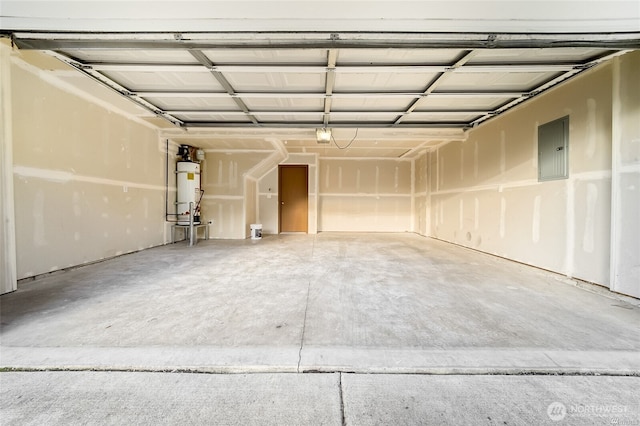 garage with strapped water heater and electric panel