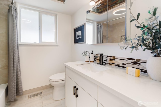 1929 201st Pl SW, Lynnwood, WA 98036 - full bath with decorative backsplash, toilet, a shower with shower curtain, and tile patterned floors