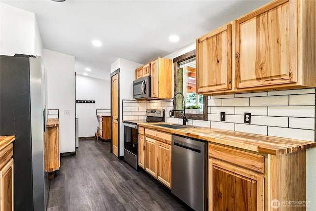 104 Ridge View Dr, Randle, WA 98377 - kitchen with stainless steel appliances, wood counters, a sink, tasteful backsplash, and dark wood-type flooring