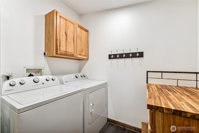 104 Ridge View Dr, Randle, WA 98377 - clothes washing area with cabinet space, independent washer and dryer, dark wood finished floors, and baseboards