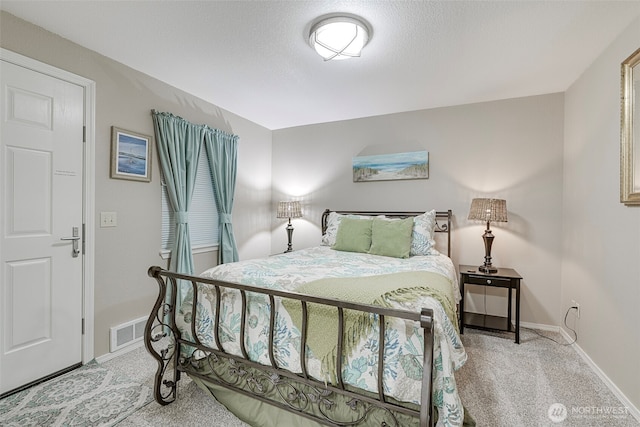 501 Shoreview Dr S Unit 204, Long Beach, WA 98631 - bedroom featuring visible vents, baseboards, and carpet floors
