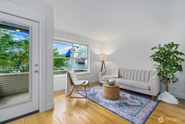 living room with wood finished floors and a wealth of natural light