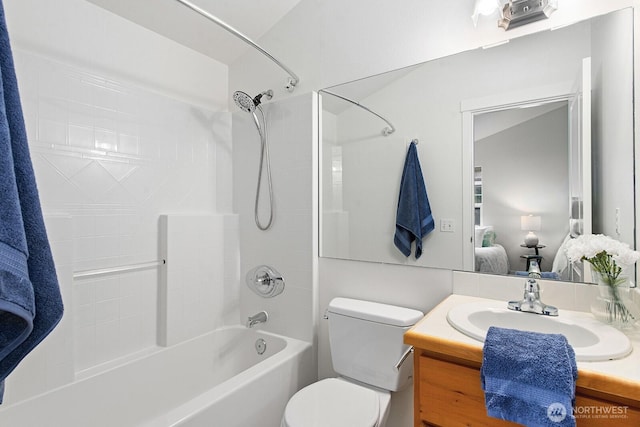 full bathroom featuring vanity, toilet, ensuite bath, and  shower combination