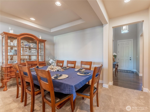 1974 Legendary Ln SE, East Wenatchee, WA 98802 - dining space featuring carpet, recessed lighting, baseboards, and a tray ceiling