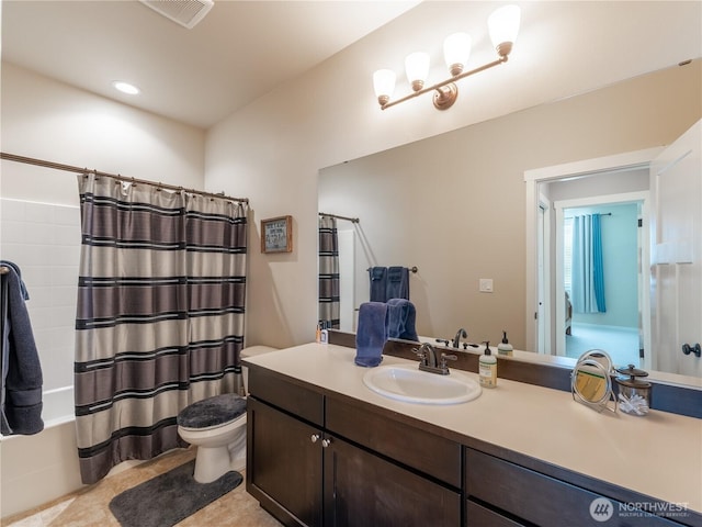 1974 Legendary Ln SE, East Wenatchee, WA 98802 - full bathroom featuring shower / bath combo, vanity, toilet, and tile patterned flooring