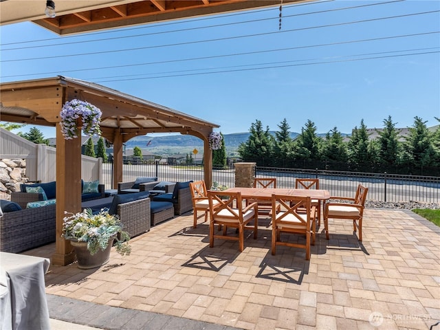 1974 Legendary Ln SE, East Wenatchee, WA 98802 - view of patio with outdoor lounge area, outdoor dining space, fence, and a gazebo