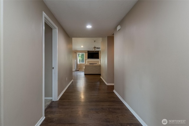 301 NE Danner Ln, College Place, WA 99324 - hall featuring recessed lighting, baseboards, and dark wood finished floors