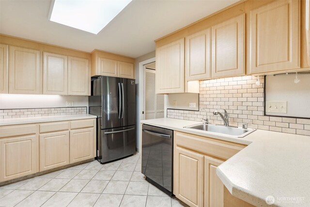 2506 SE Baypoint Dr Unit L45, Vancouver, WA 98683 - kitchen with freestanding refrigerator, a sink, dishwasher, and light brown cabinetry