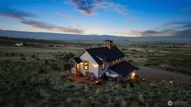 aerial view at dusk with a rural view