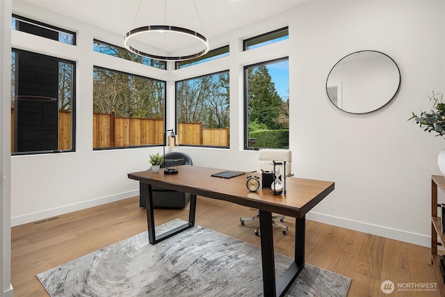 422 98th Ave NE, Bellevue, WA 98004 - office space with baseboards, wood finished floors, and visible vents