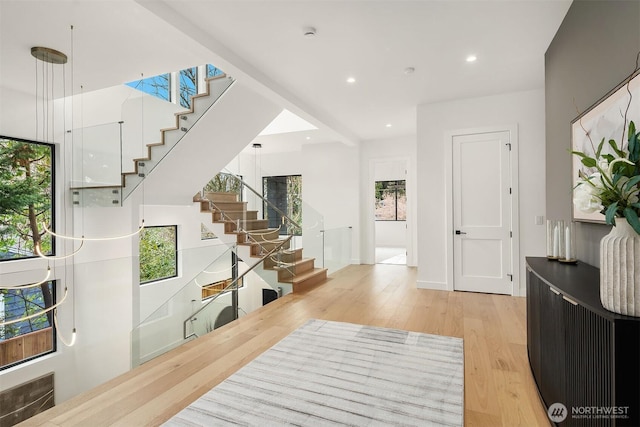 422 98th Ave NE, Bellevue, WA 98004 - entrance foyer featuring recessed lighting, wood finished floors, a wealth of natural light, and stairway