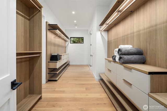 422 98th Ave NE, Bellevue, WA 98004 - walk in closet with light wood-style floors