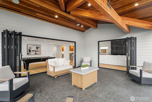 422 98th Ave NE, Bellevue, WA 98004 - living room featuring wooden walls, dark tile patterned flooring, pool table, and vaulted ceiling with beams