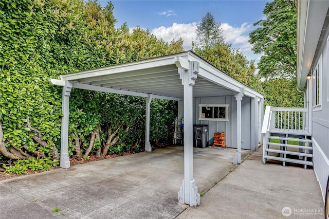 8760 State Highway 303 NE Unit C, Bremerton, WA 98311 - view of patio / terrace with concrete driveway and a carport