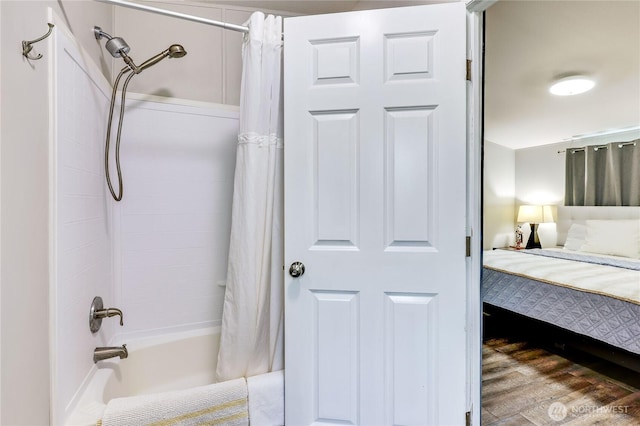 8760 State Highway 303 NE Unit C, Bremerton, WA 98311 - ensuite bathroom with ensuite bathroom, wood finished floors, and shower / tub combo with curtain